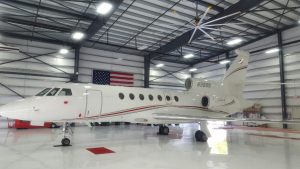 Interior of Naples Airplane Hangar. Complete repanting of rusting metal beams